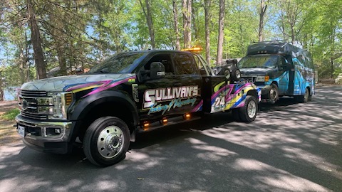 Cargo unloading by Sullivan's Towing & Recovery